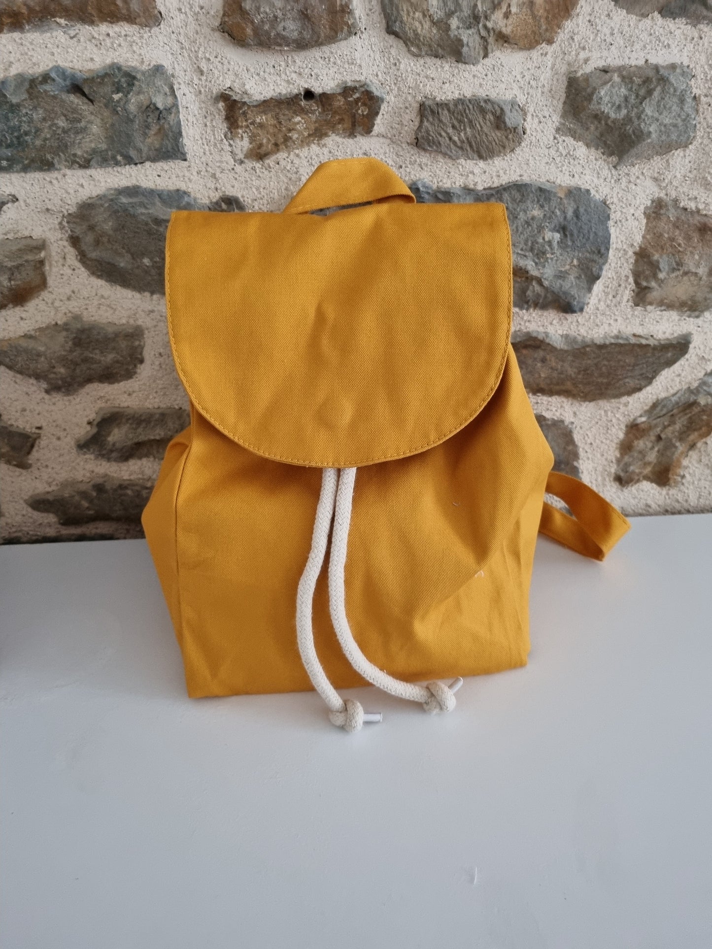 Sac a dos moutarde C.S.Créatif