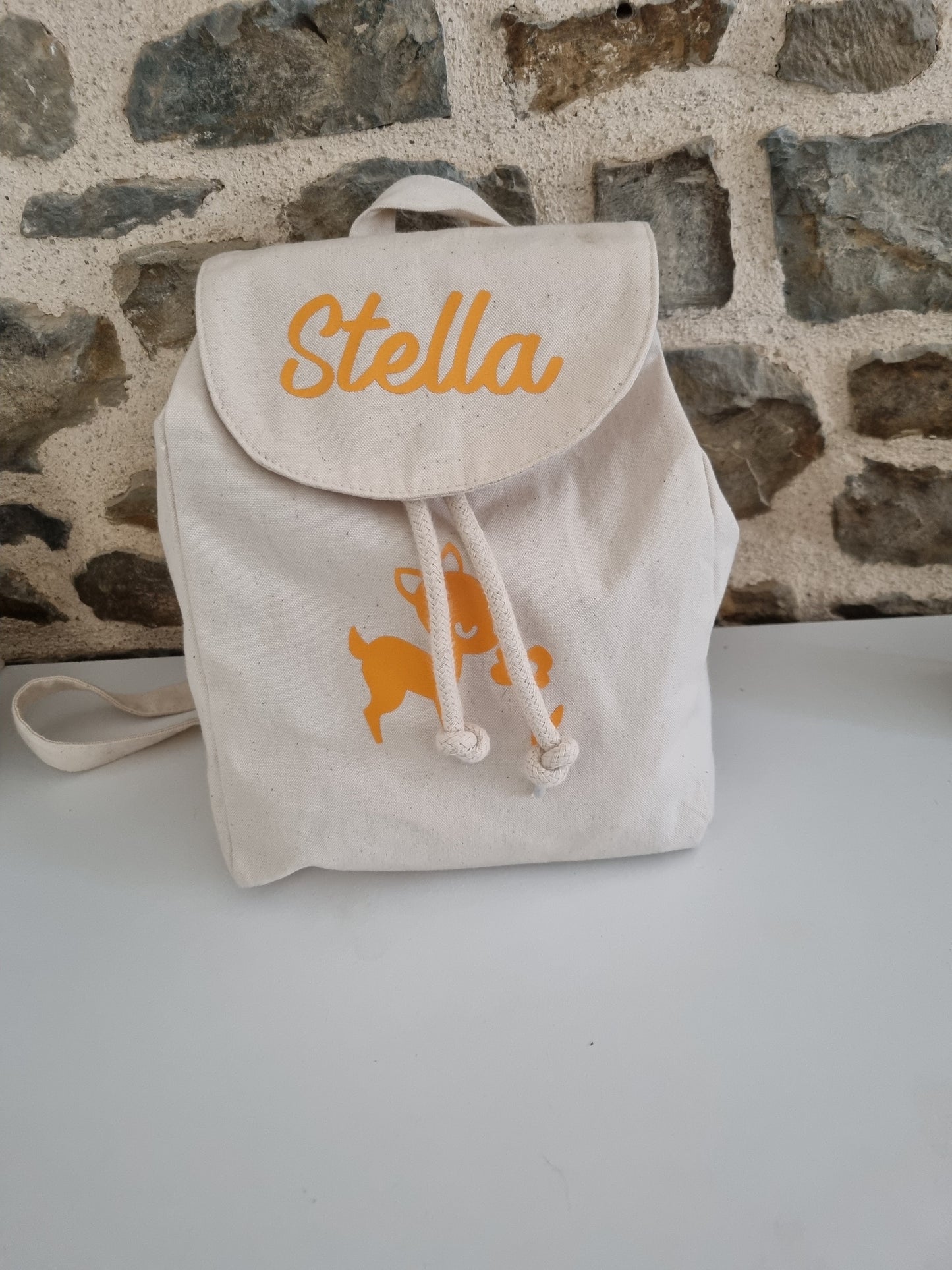 Sac a dos beige C.S.Créatif