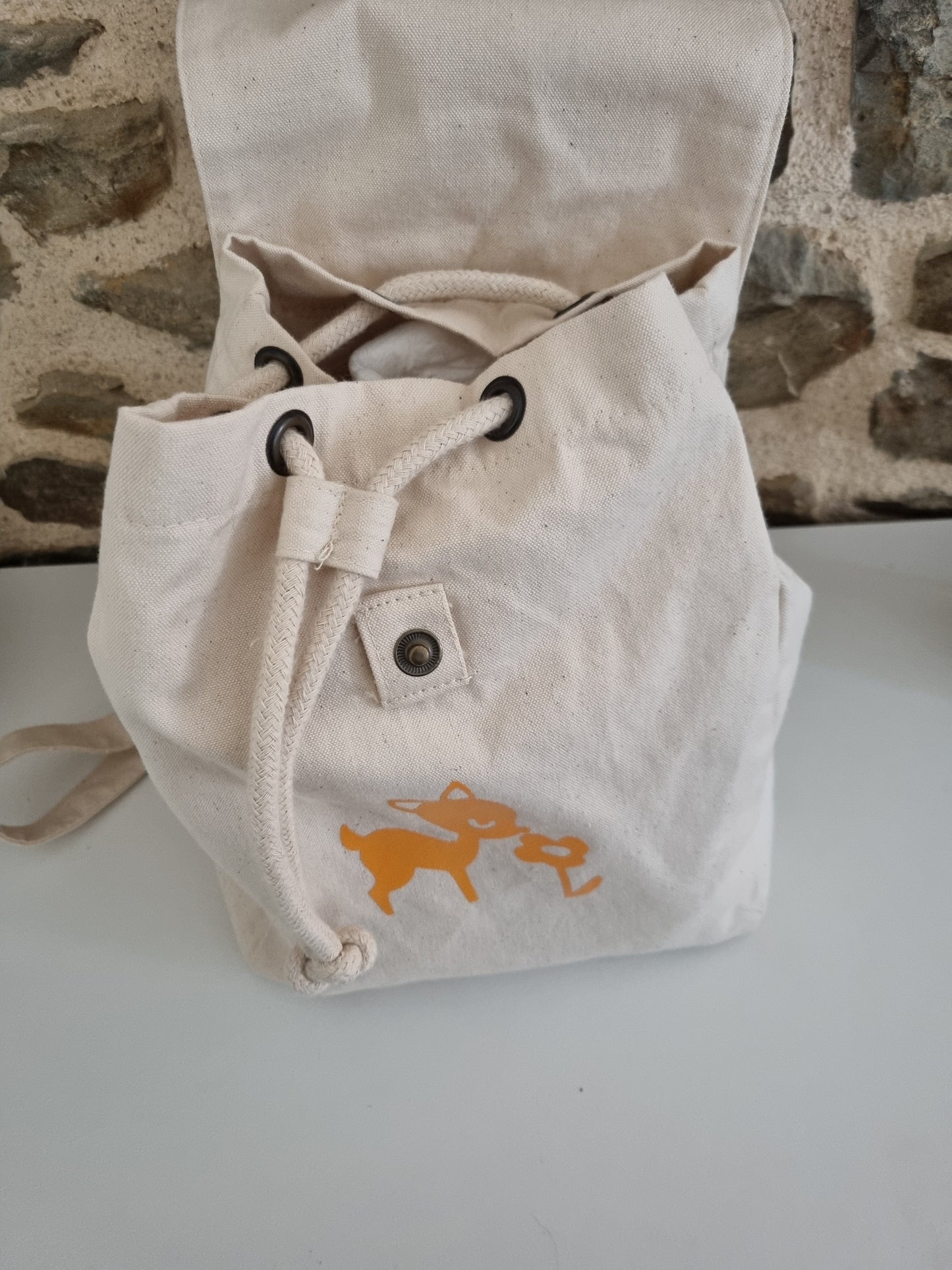 Sac a dos beige C.S.Créatif