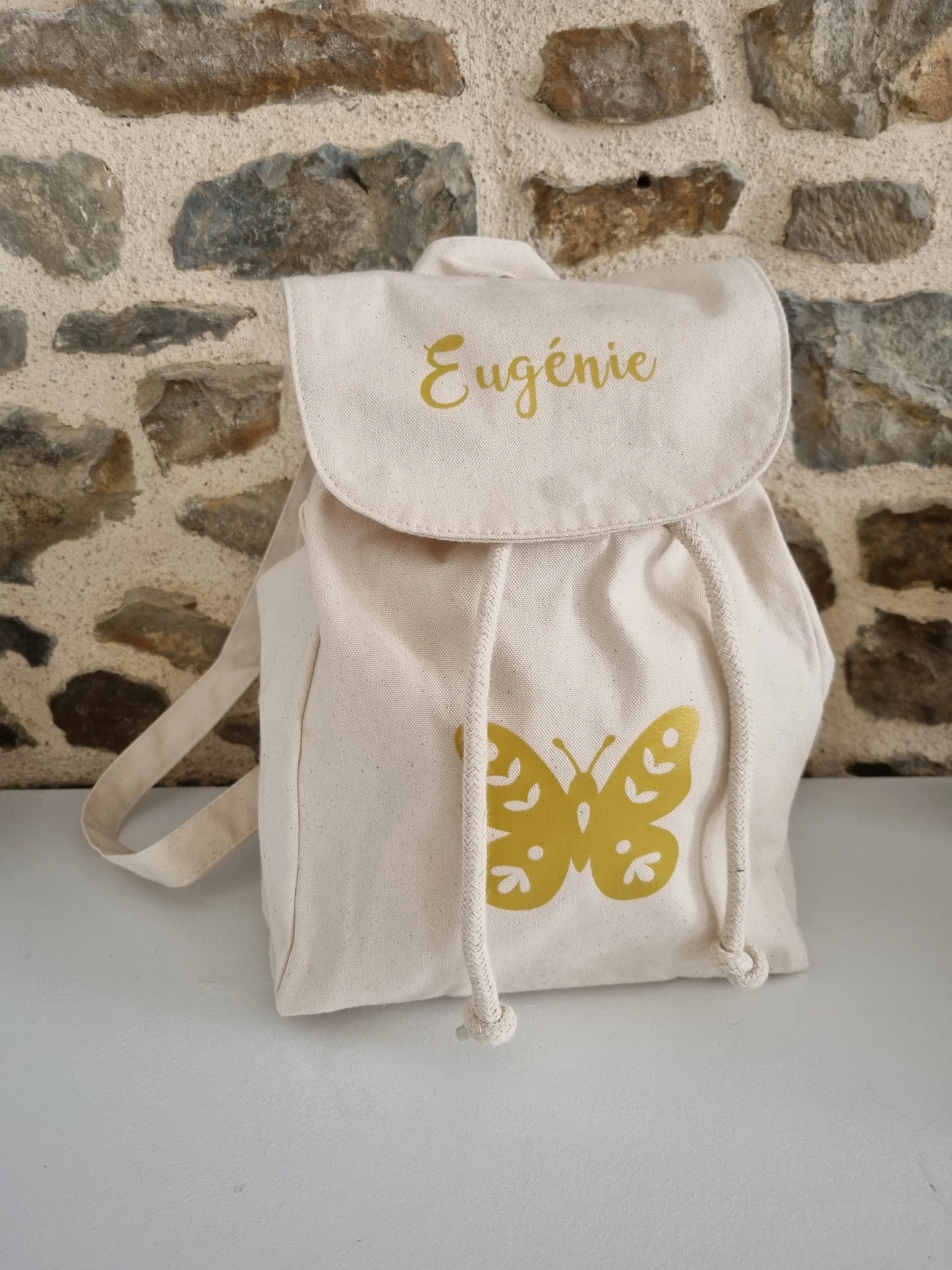 Sac a dos beige C.S.Créatif