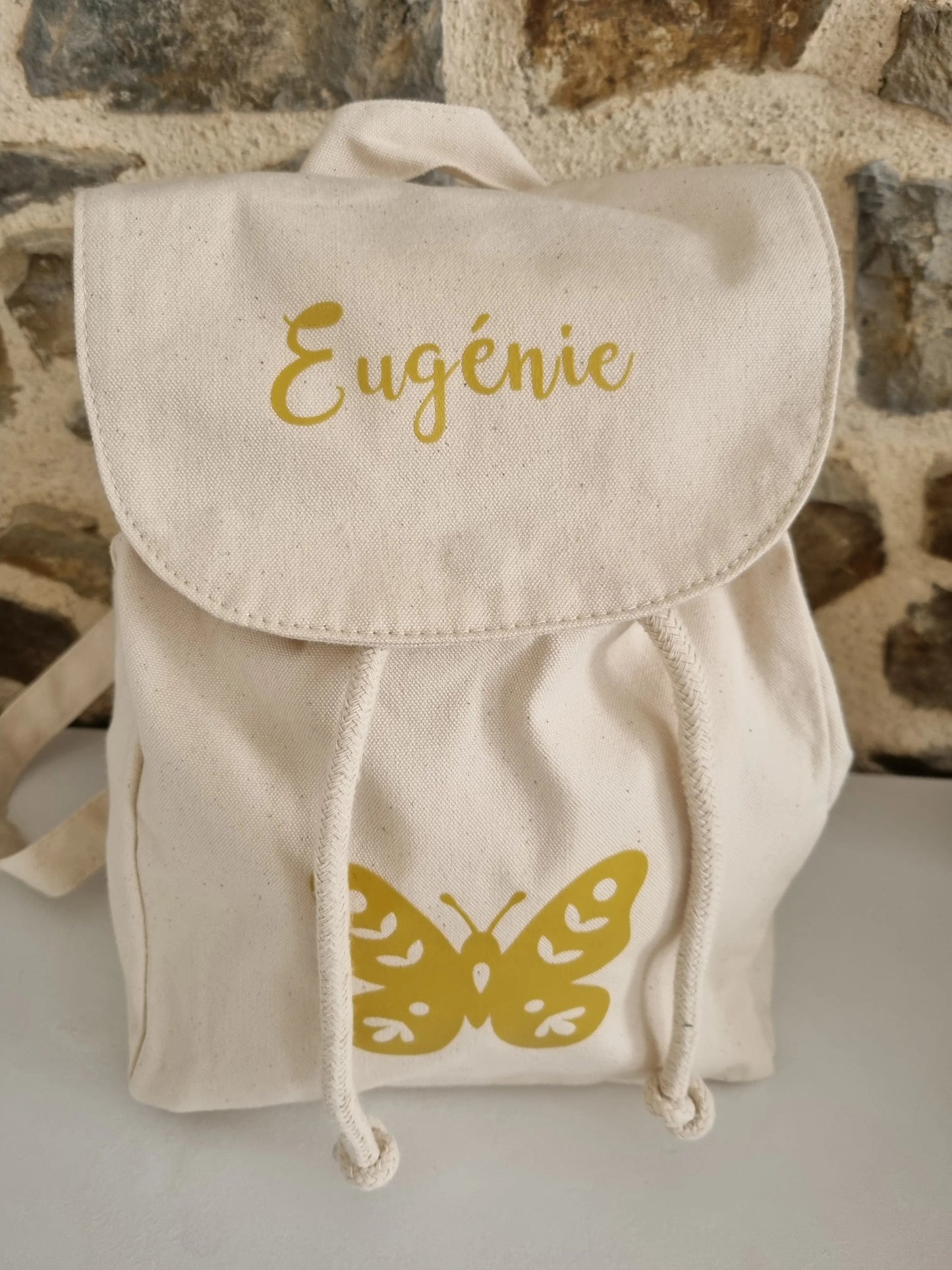 Sac a dos beige C.S.Créatif