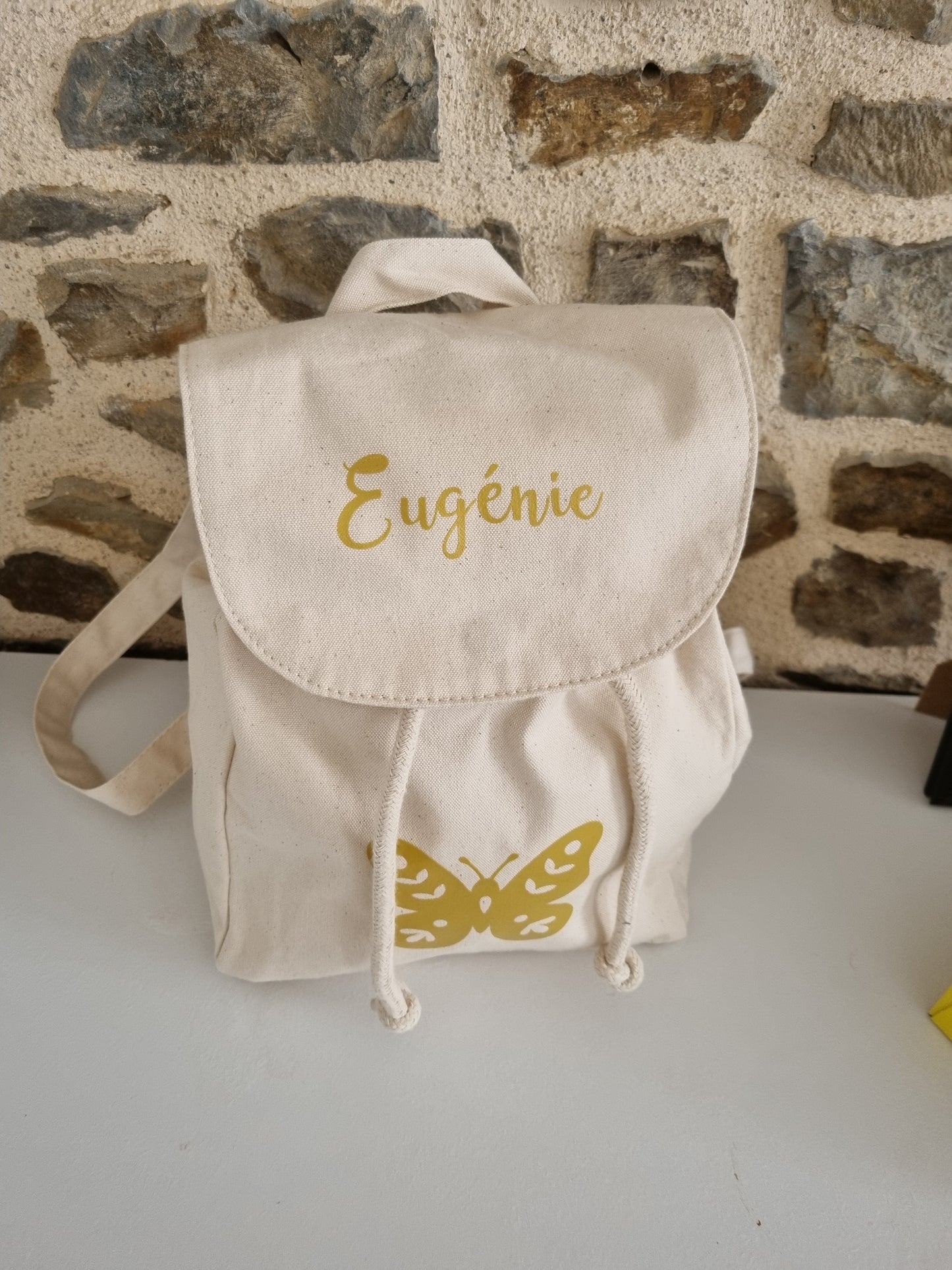 Sac a dos beige C.S.Créatif