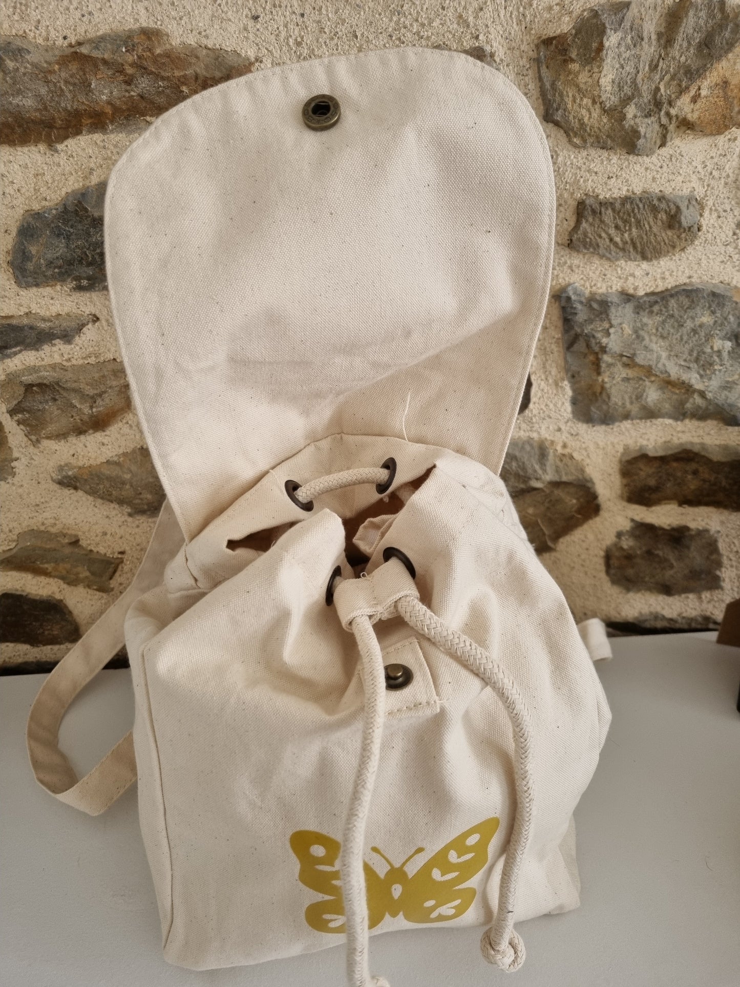 Sac a dos beige C.S.Créatif